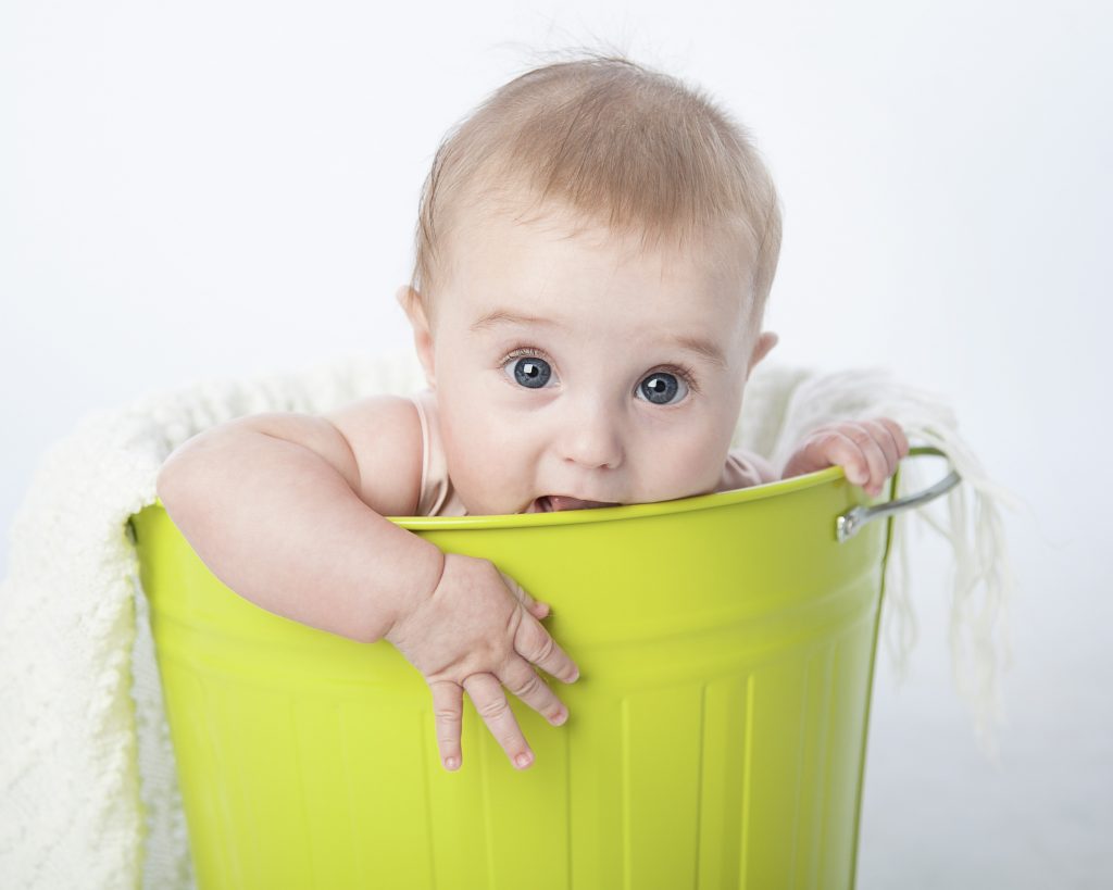 baby in a bucket